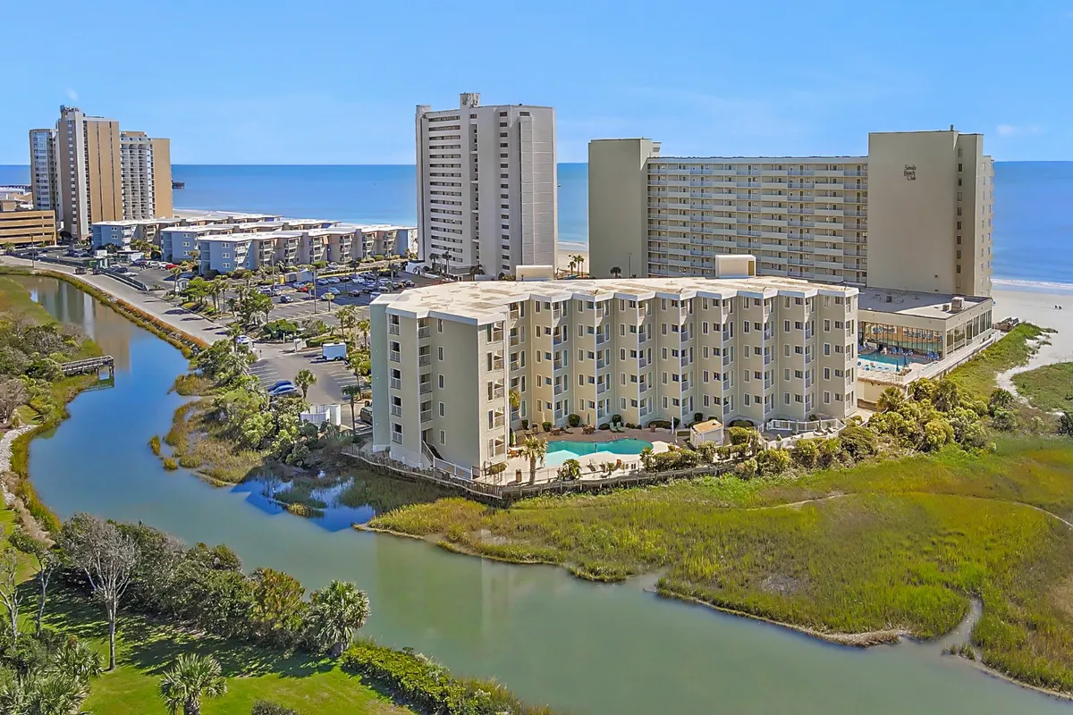 Condominium buildings at Sands Beach Club between the marsh and the ocean on Shore Drive