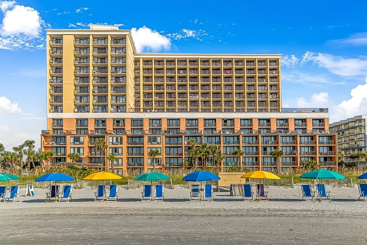 The oceanfront towers of the Caravelle Resort seen from the beach in Myrtle Beach