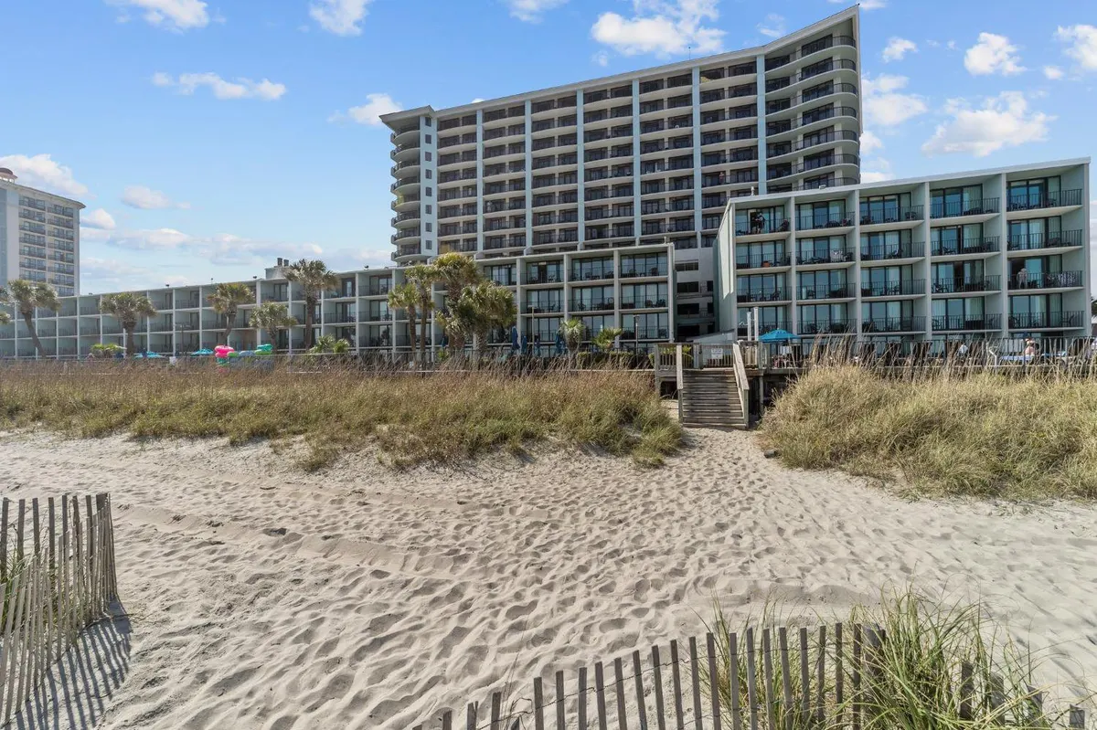 Compass Cove resort towers and pools beside the beach in Myrtle Beach