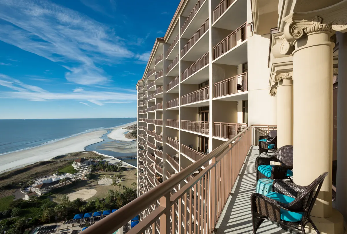 A balcony at North Beach Resort looking down the beach and the swash