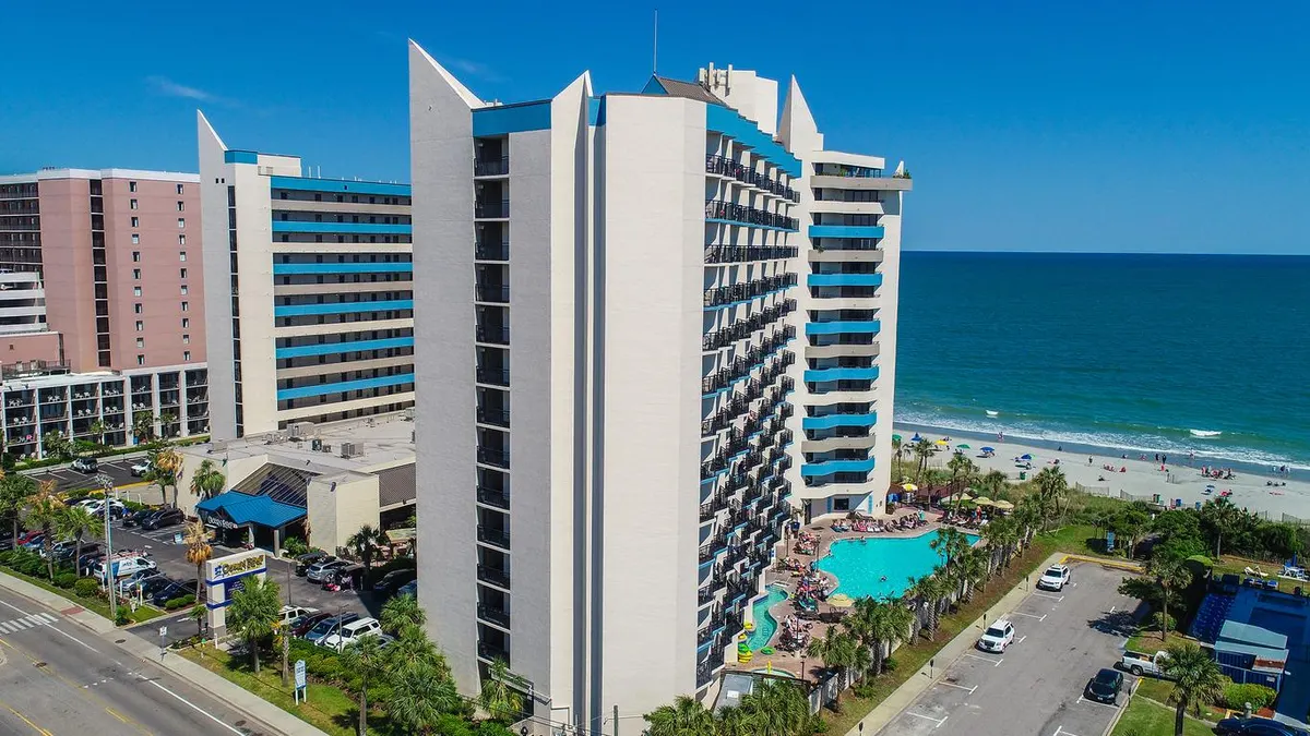 Ocean Reef Resort with its pools between the tower and the beach